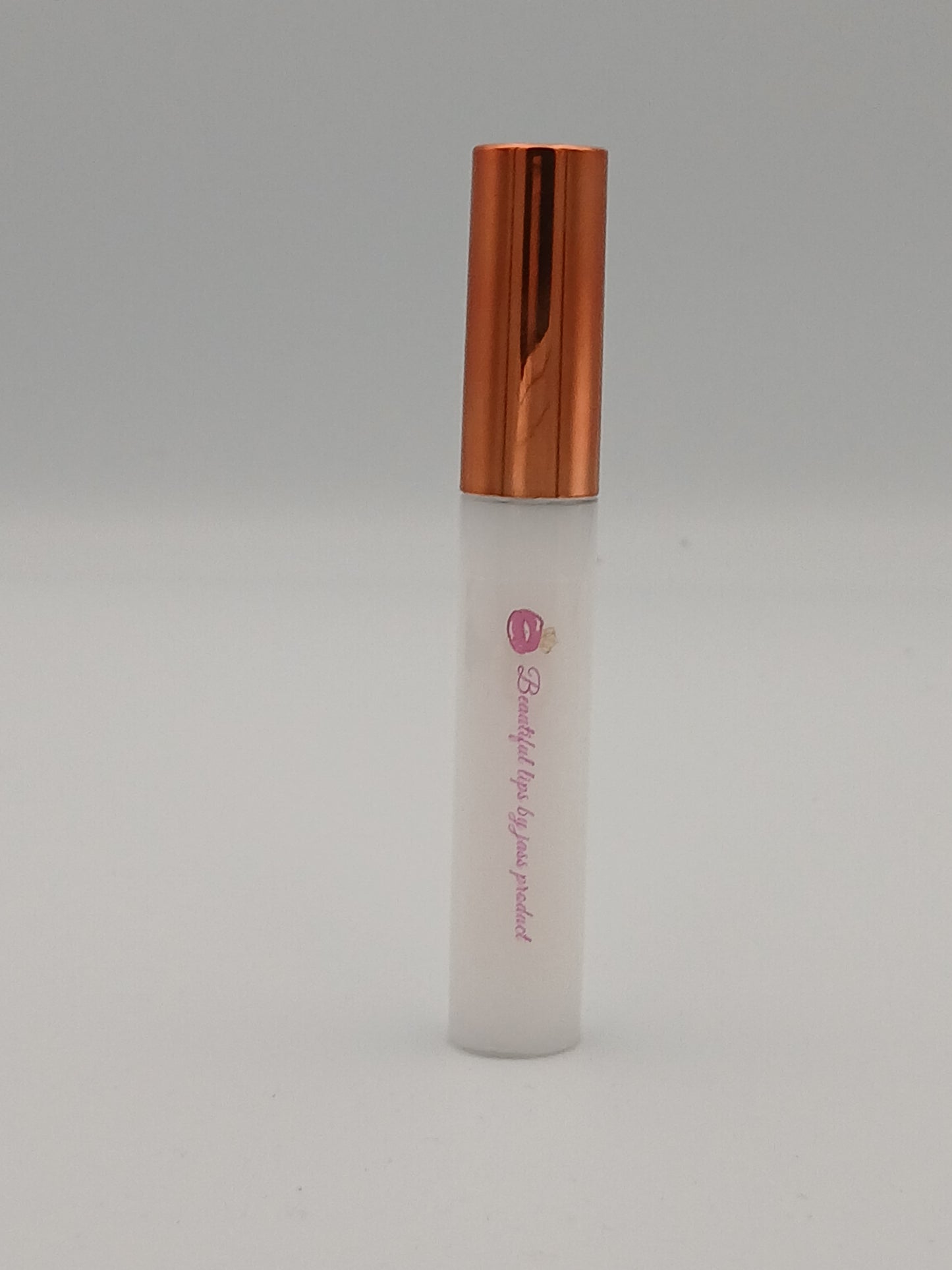 Lip gloss by jass production This lip gloss is made with jojoba oil, coconut oil, and mica powder to give your lips a natural shine and a soft, smooth feel. It hydrates, protects, and adds a radiant glow that makes you feel beautiful every day.