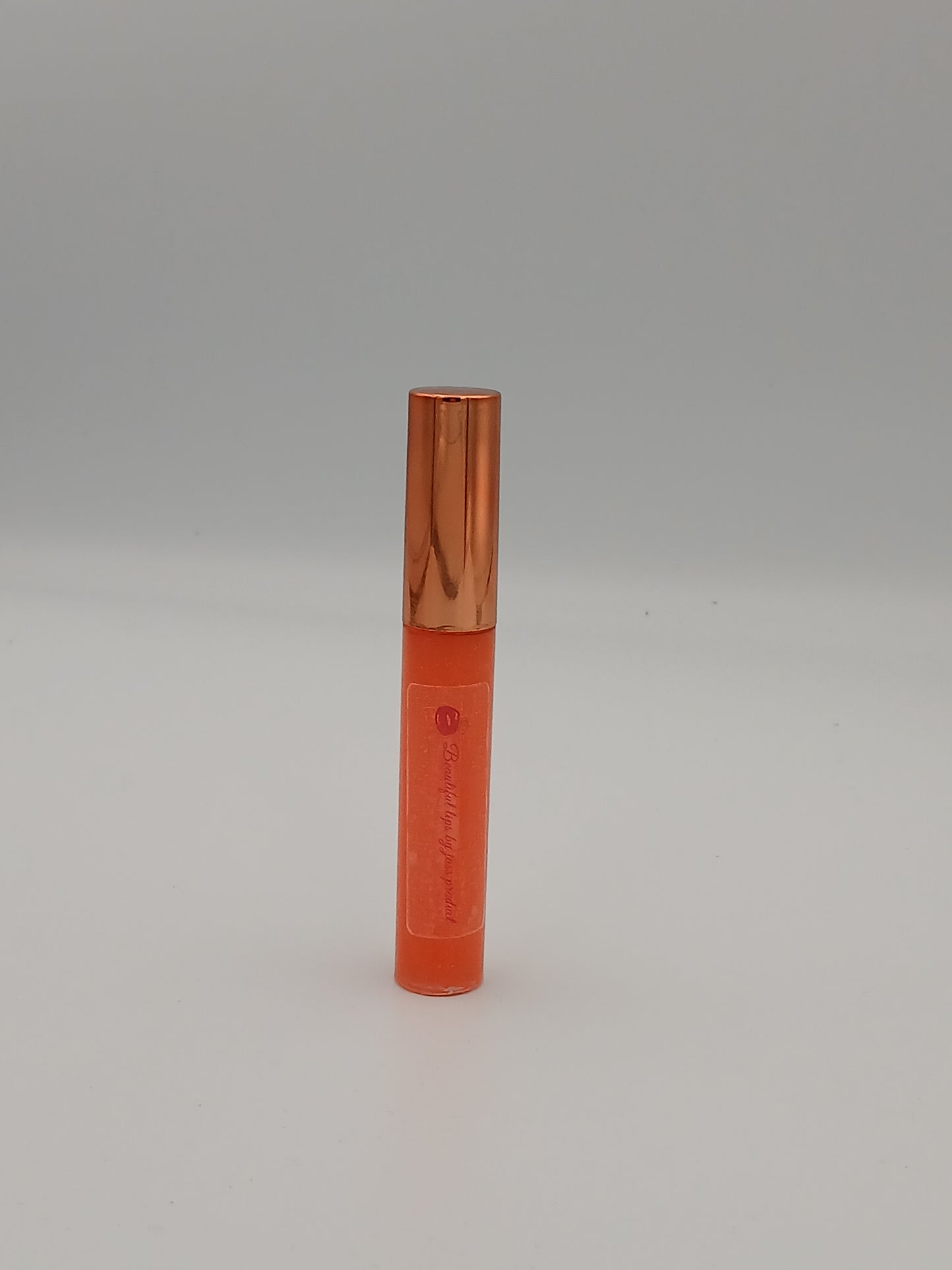 Lip gloss by jass production This lip gloss is made with jojoba oil, coconut oil, and mica powder to give your lips a natural shine and a soft, smooth feel. It hydrates, protects, and adds a radiant glow that makes you feel beautiful every day.