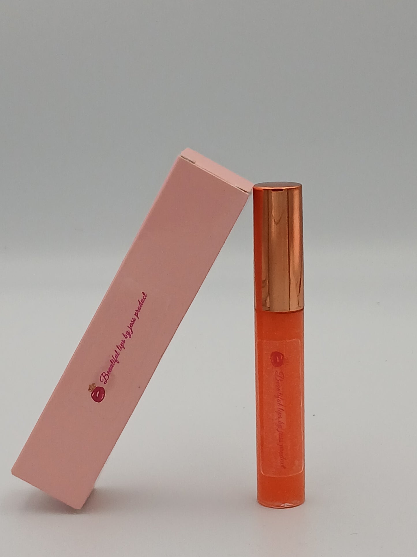 Lip gloss by jass production This lip gloss is made with jojoba oil, coconut oil, and mica powder to give your lips a natural shine and a soft, smooth feel. It hydrates, protects, and adds a radiant glow that makes you feel beautiful every day.