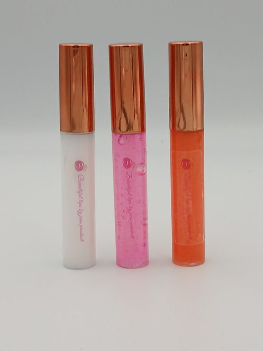 Lip gloss by jass production This lip gloss is made with jojoba oil, coconut oil, and mica powder to give your lips a natural shine and a soft, smooth feel. It hydrates, protects, and adds a radiant glow that makes you feel beautiful every day.